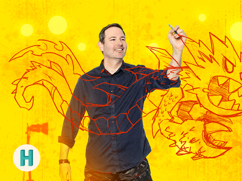 Foto af Jan Kjær, der tegner en drage